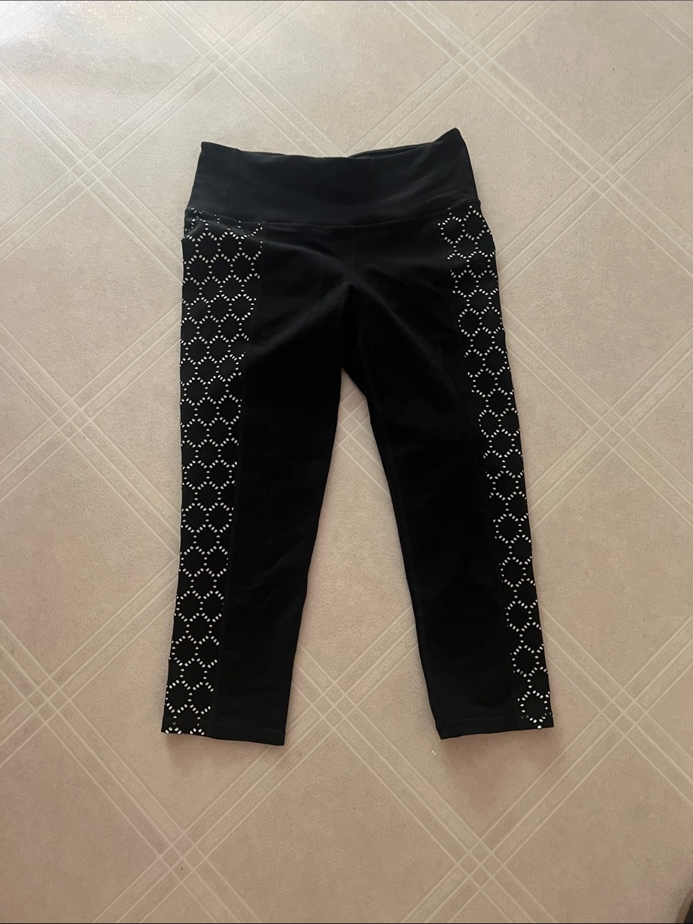 Athleta Black Capri Leggings with White Dot Lattice Side Panels